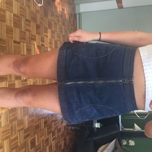 Lightly used zip up jean skirt with pockets